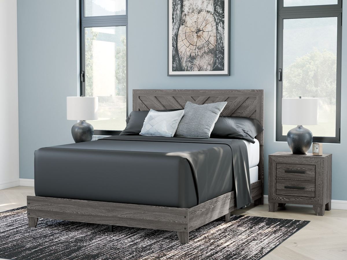 Sylveri Warm Gray Chevron Panel Bed in a bedroom