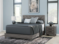 Sylveri Warm Gray Chevron Panel Bed in a bedroom