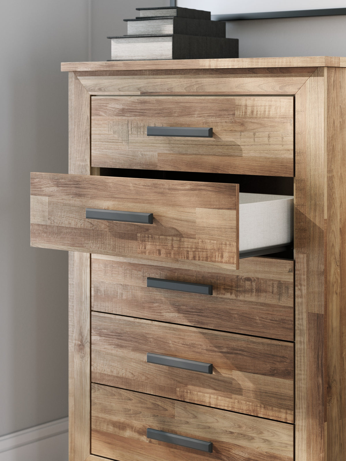 Finaria Warm Brown Five Drawer Chest drawer detail